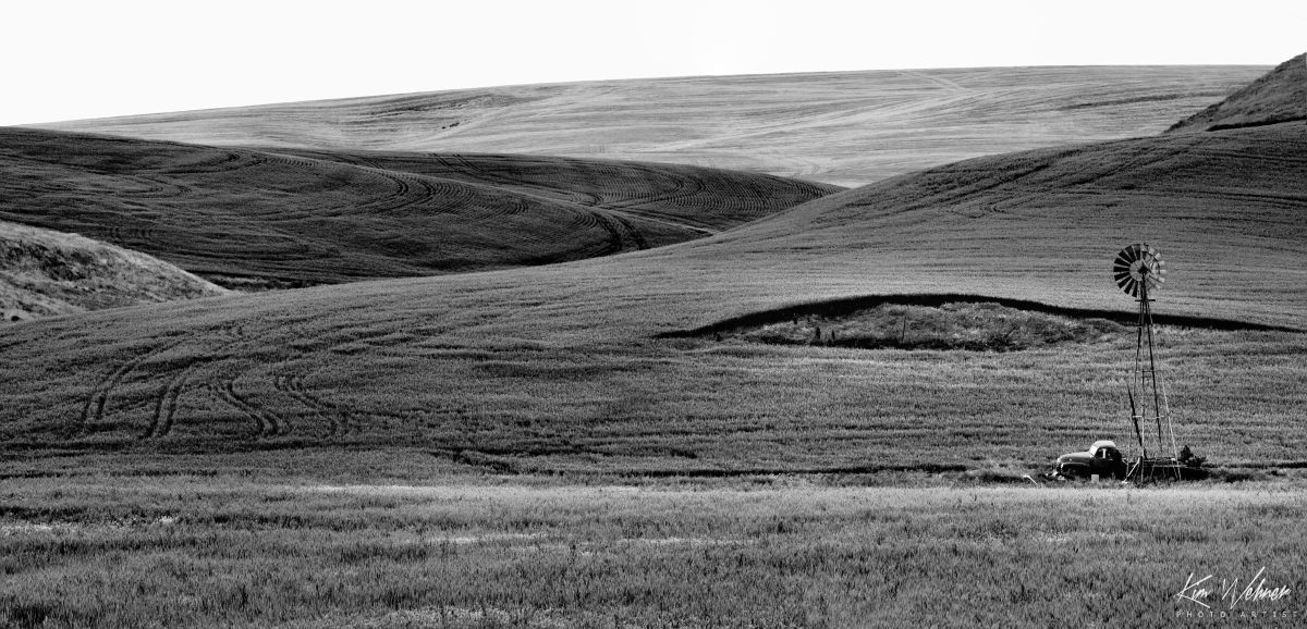 Windmill and Truck on the Hills
